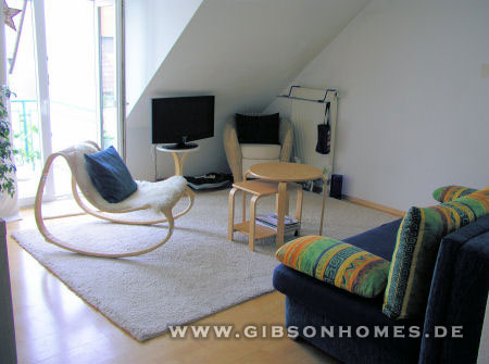 Wohnzimmer mit Balkon - Maisonette in 63263 Neu-Isenburg